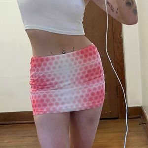 Redish/pink and white spotted mini skirt